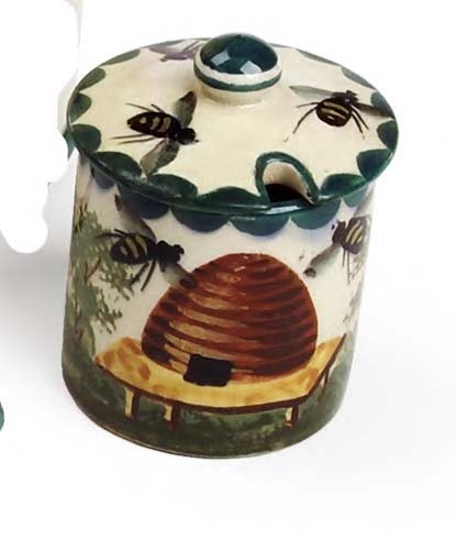 A Wemyss miniature honey pot and cover,