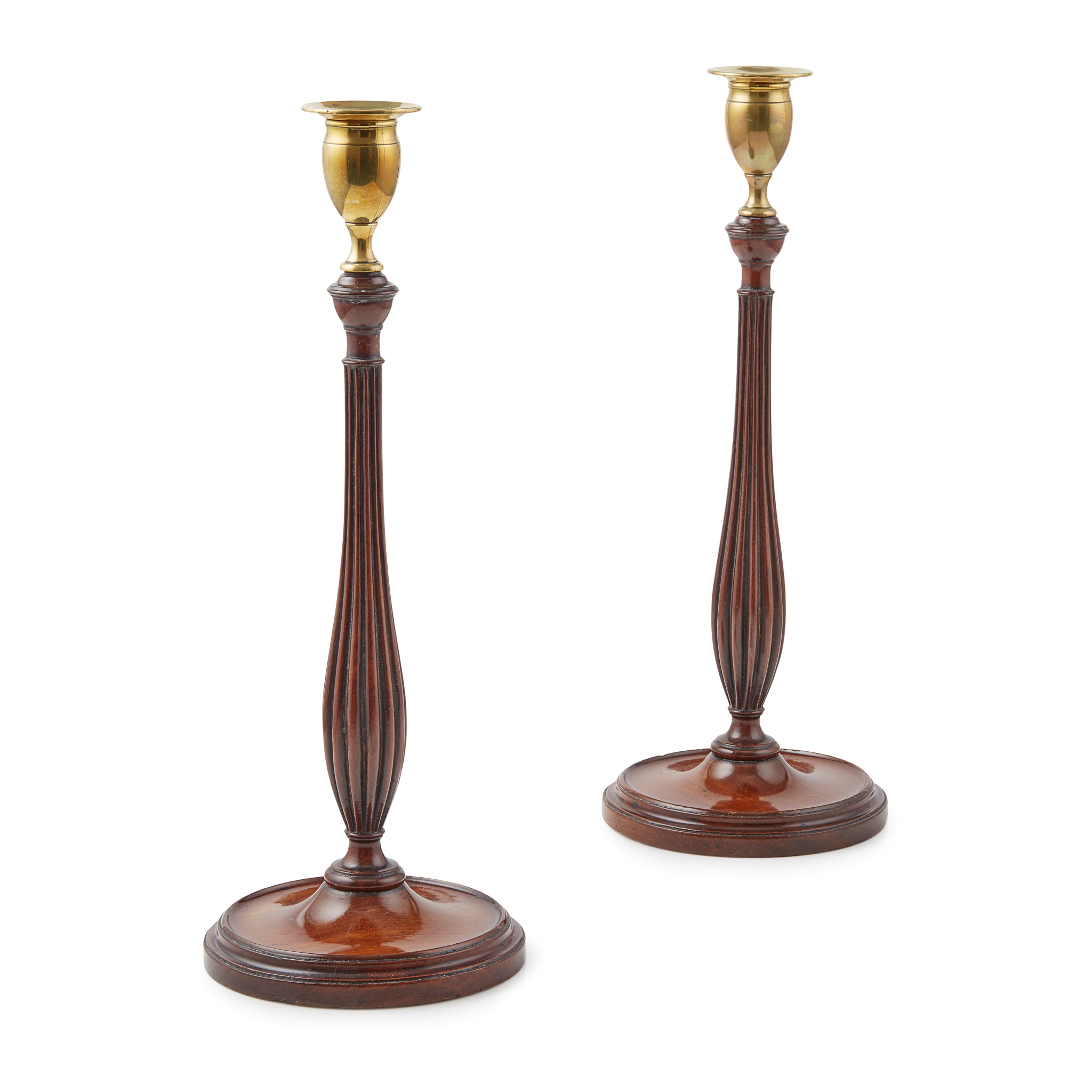 PAIR OF GEORGIAN MAHOGANY AND BRASS CANDLESTICKS