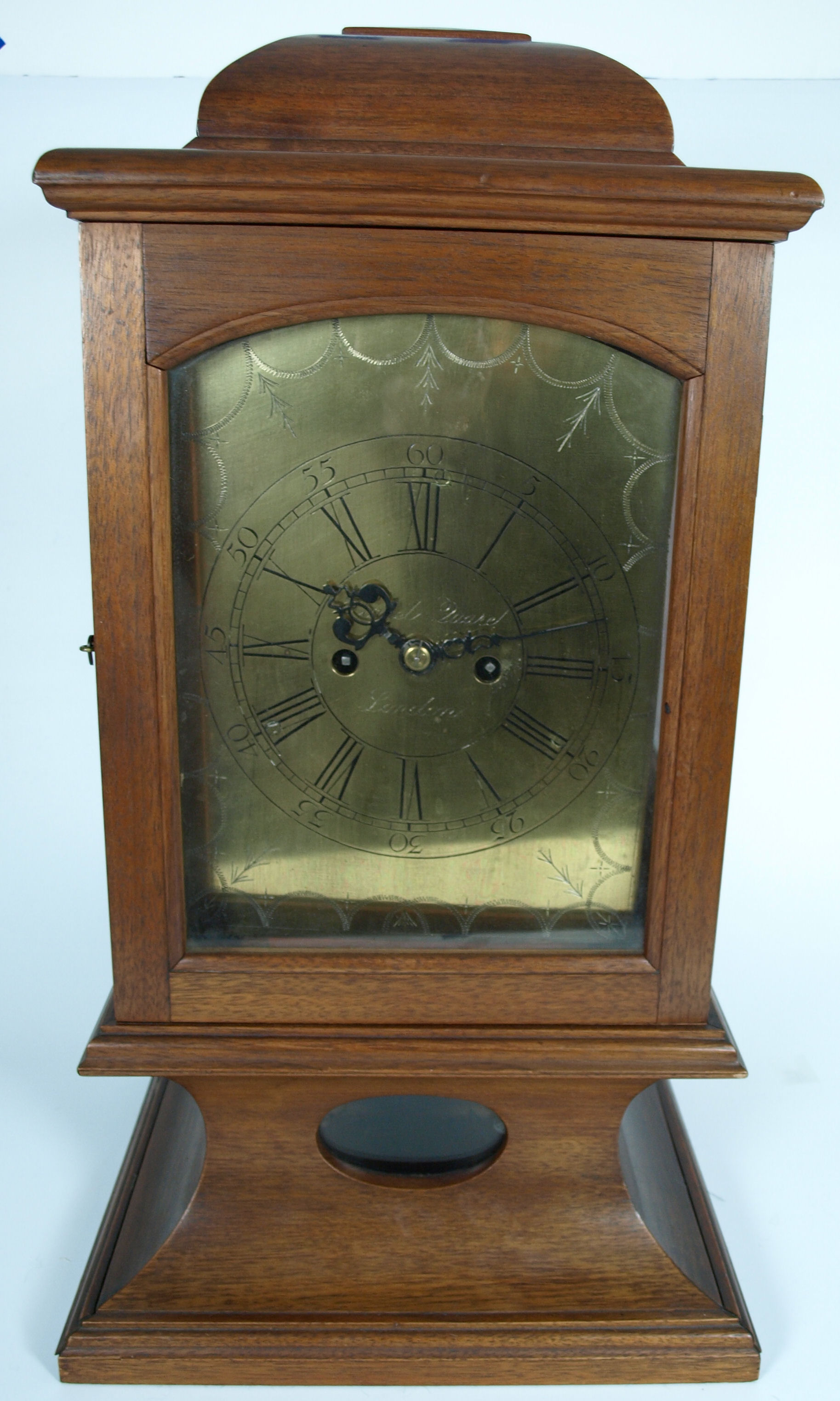 A twin fusee bracket clock movement The dial marked 'Daniel Quare', in a later walnut display case