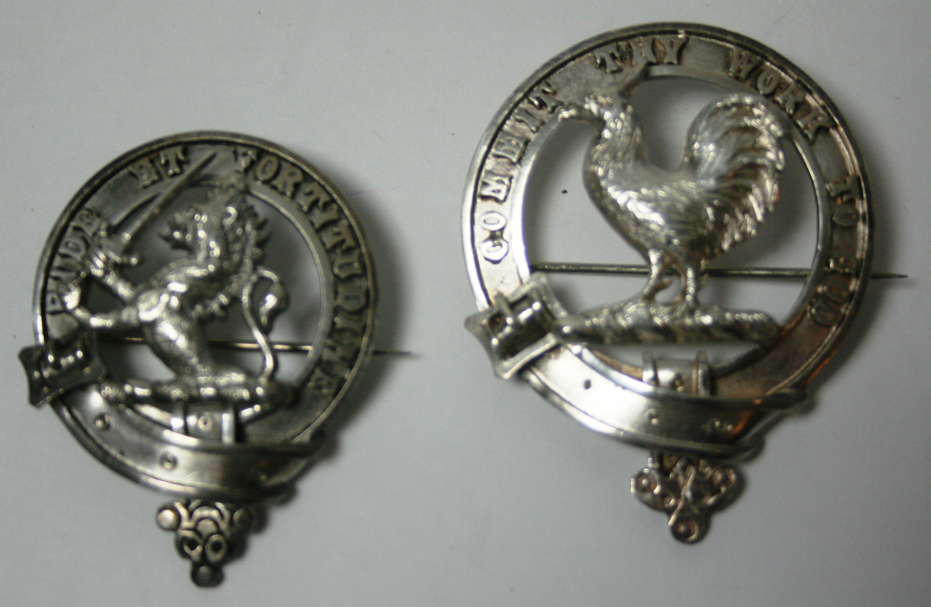 Inverness - two Scottish provincial clan badges