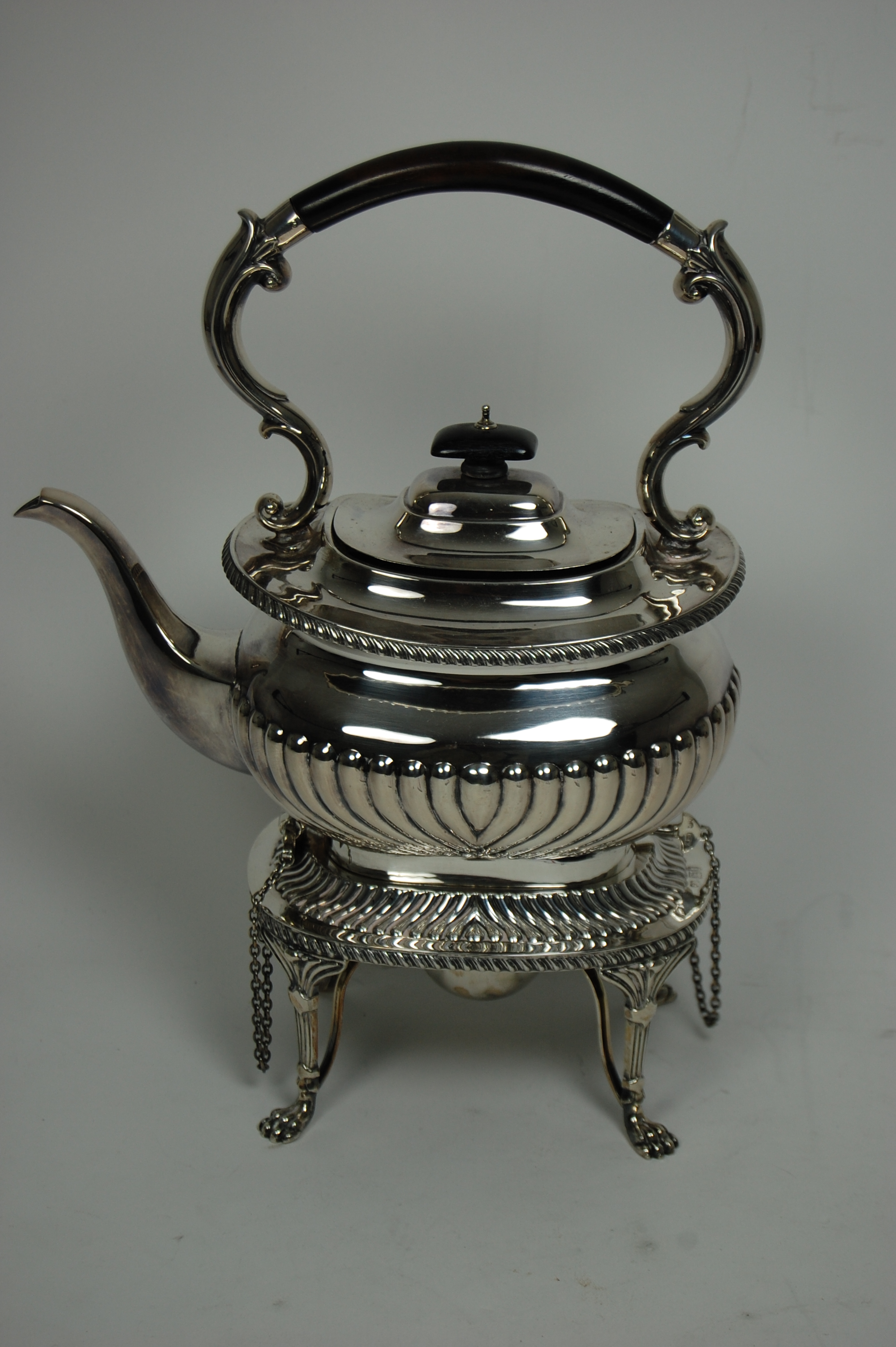 An Edwardian spirit kettle and stand