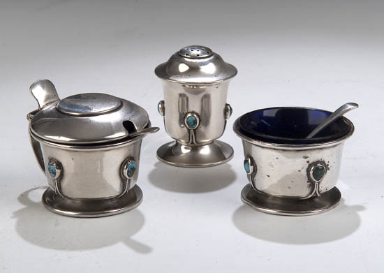 A Liberty & Co three-piece silver cruet set