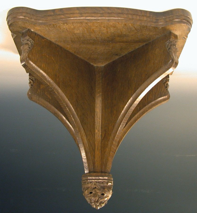 An oak wall bracket, the design attributed to Sir Robert Lorimer