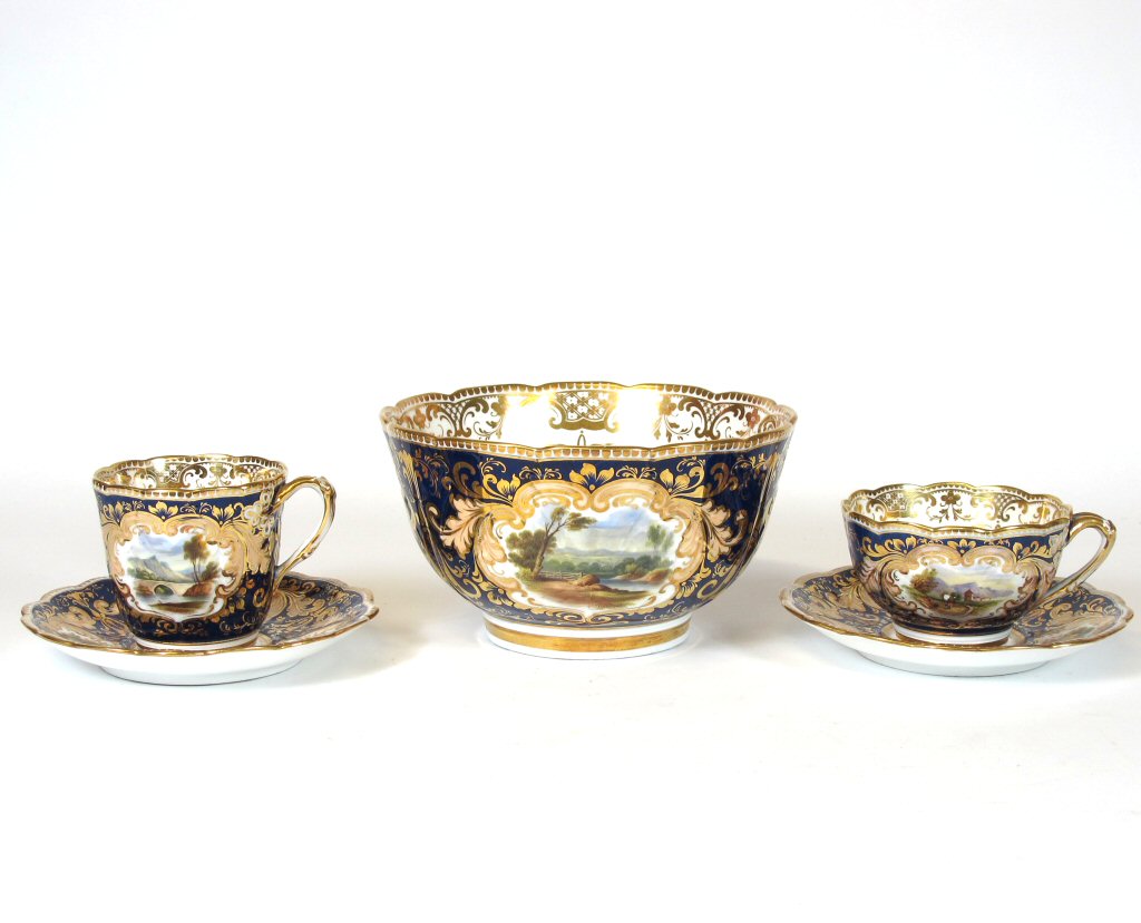 A late 19th/ early 20th century part tea and coffee service In the Coalport manner
