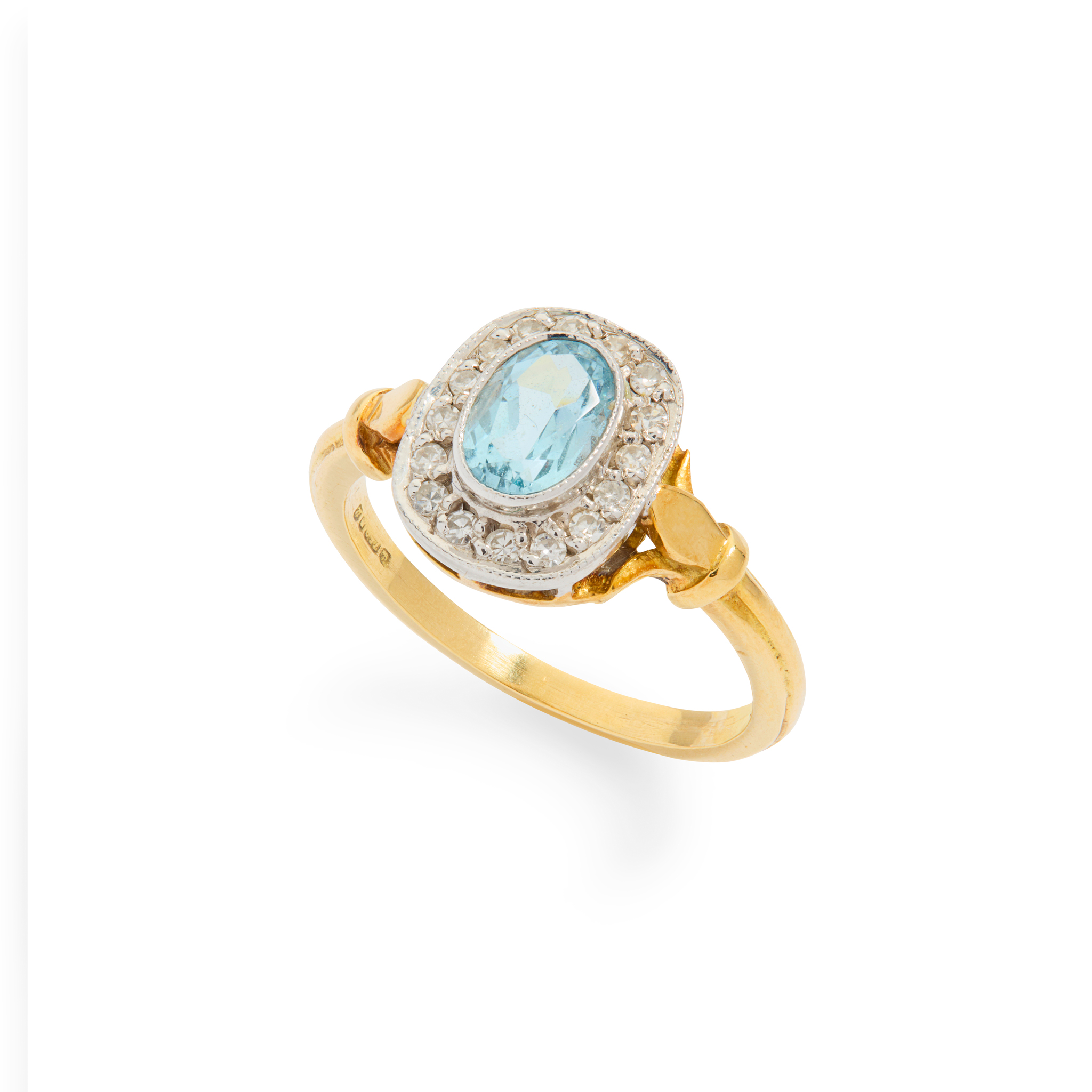 An 18ct gold aquamarine and diamond ring