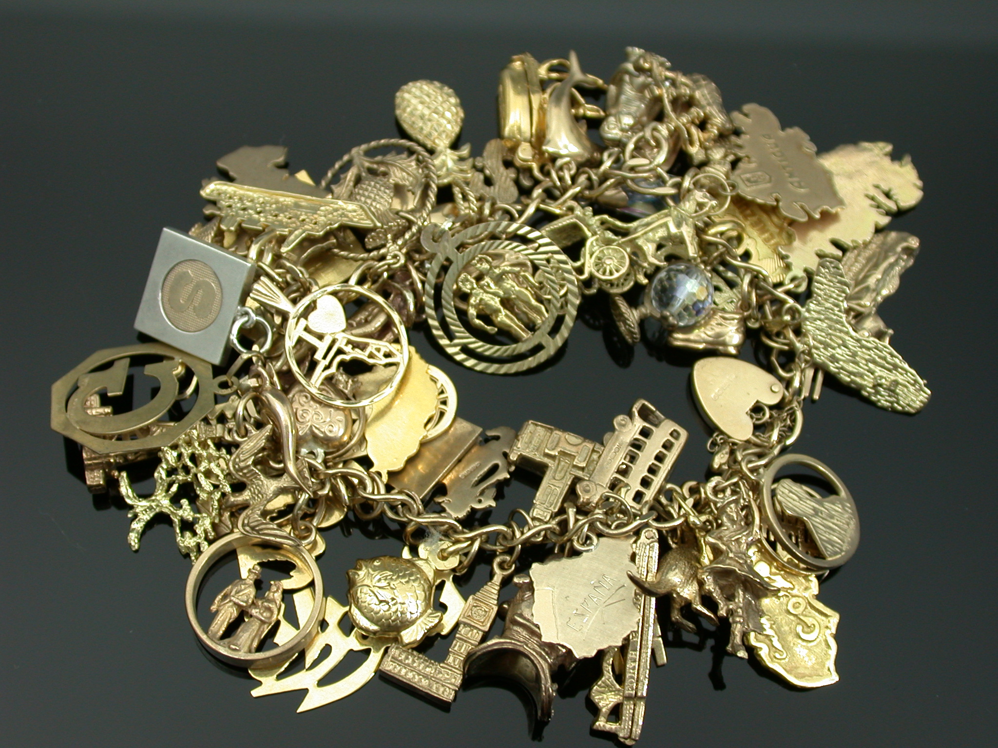 A 9ct gold charm bracelet,