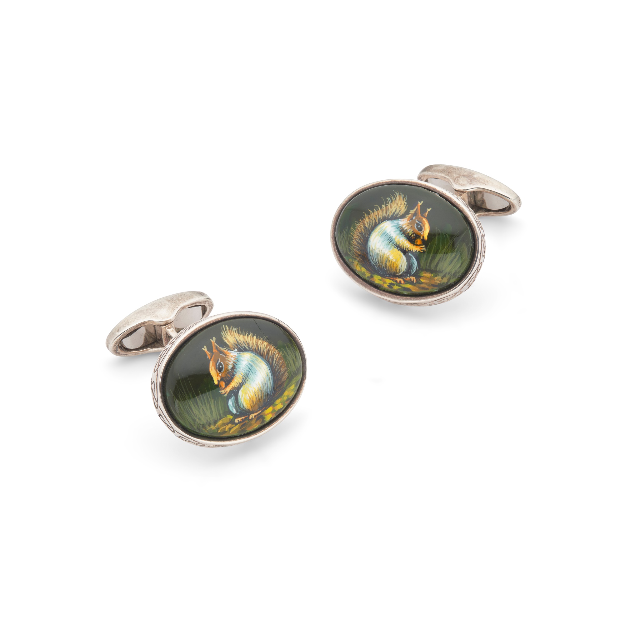 A pair of silver and enamel 'squirrel' cufflinks