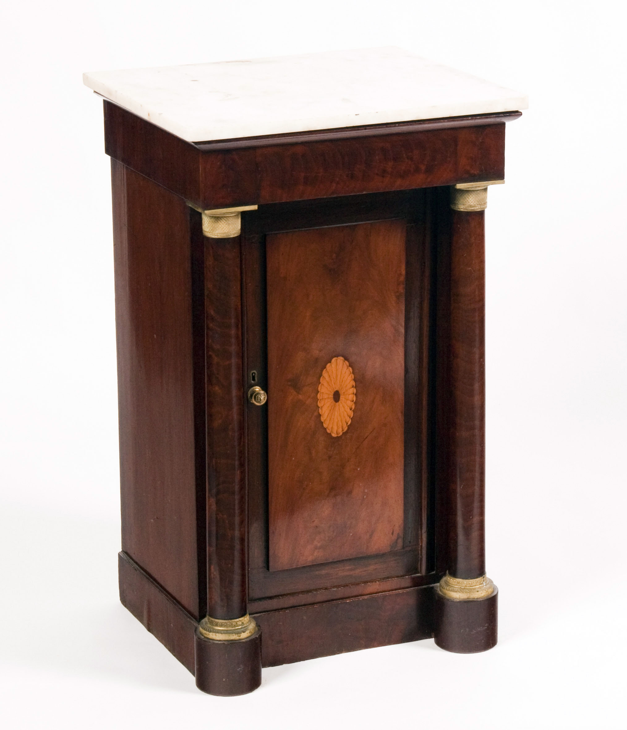 A 19th century French Empire style mahogany bedside cupboard
