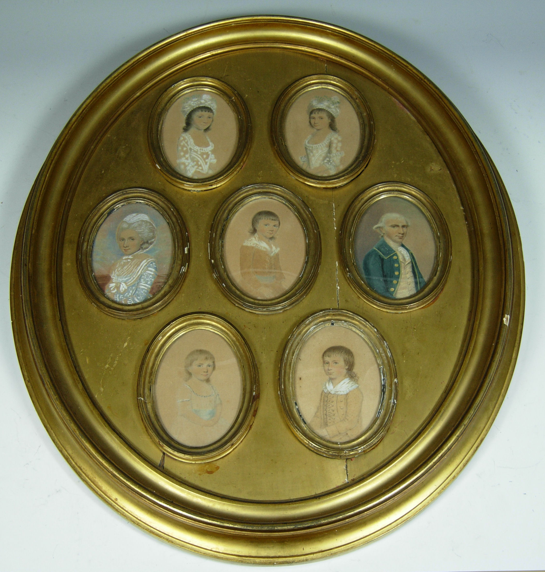 A framed collection of family portrait miniatures