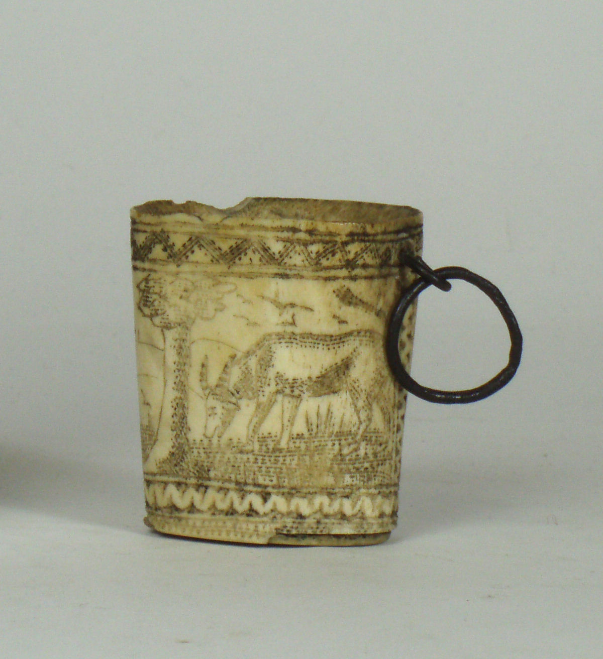 A late 18th/ early 19th century carved bone cup