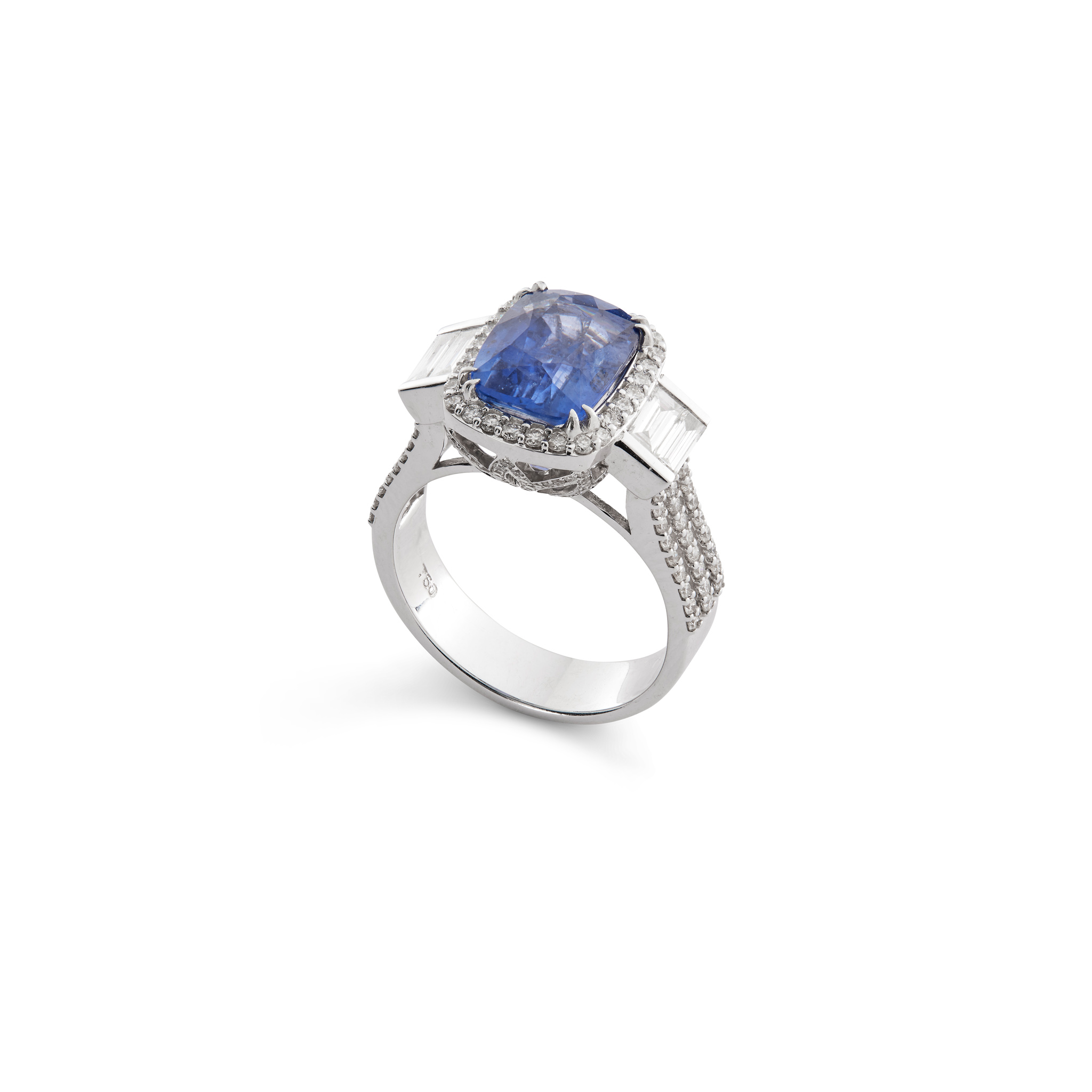 A cushion-shaped sapphire and diamond dress ring