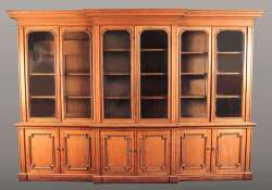 A suite of Edwardian oak library bookcases