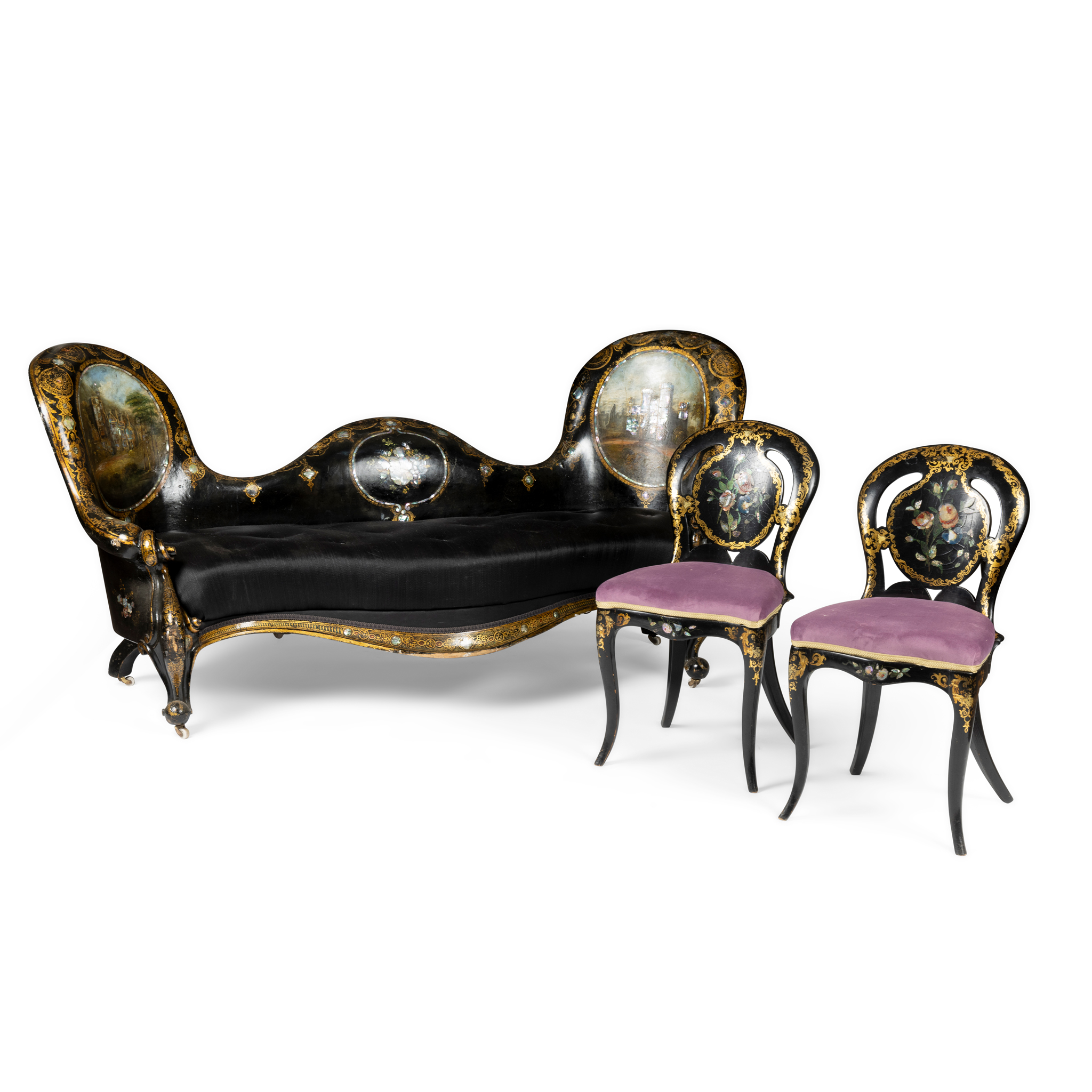 A VICTORIAN PAPIER MACHE AND EBONISED SETTEE