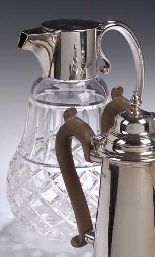A mounted glass claret jug,
