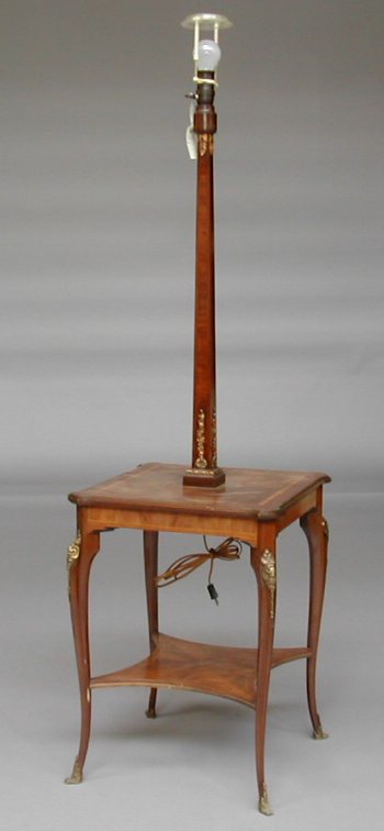 A Louis XVI style mahogany and kingwood lamp and table