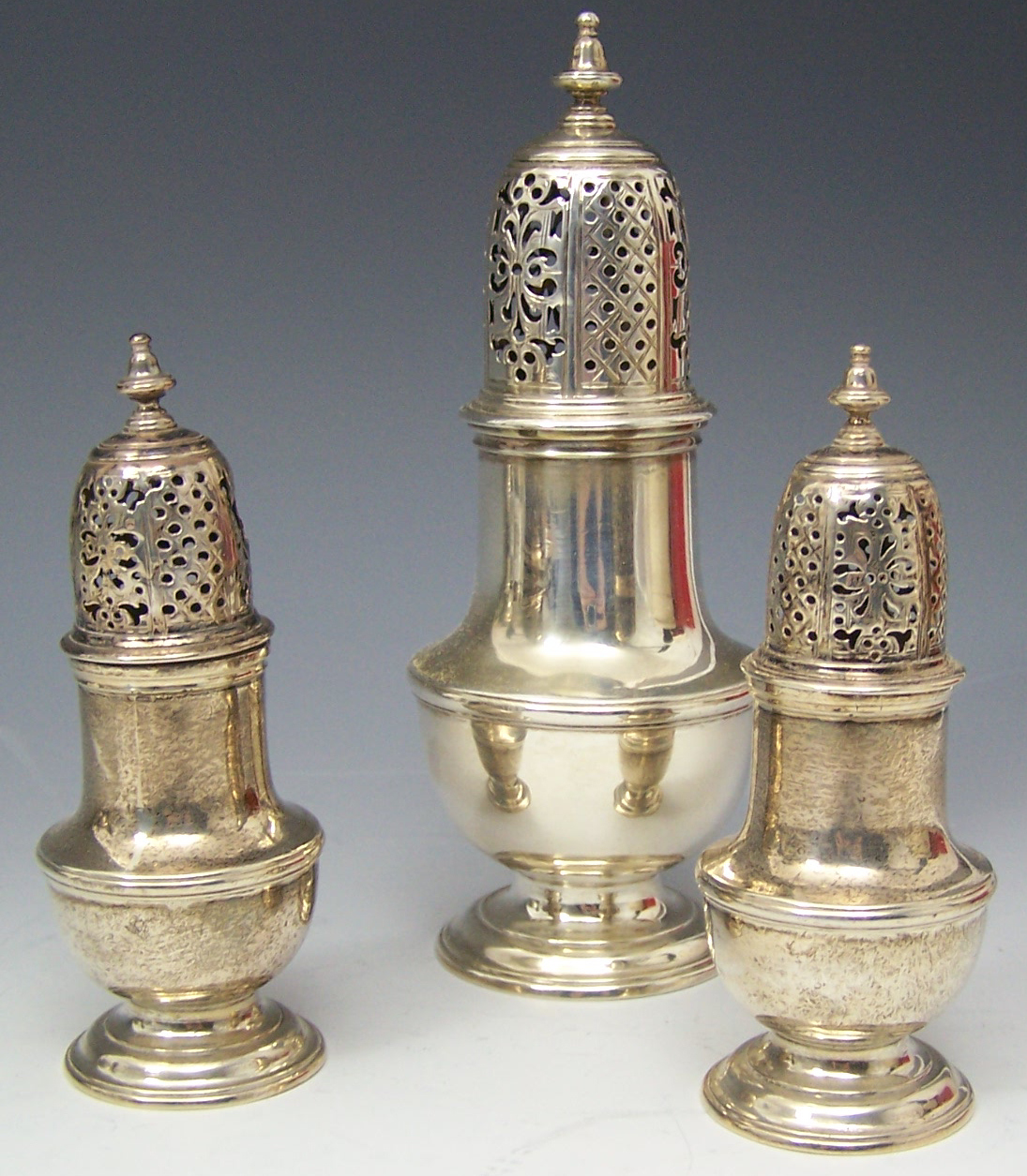 A set of three George II casters,