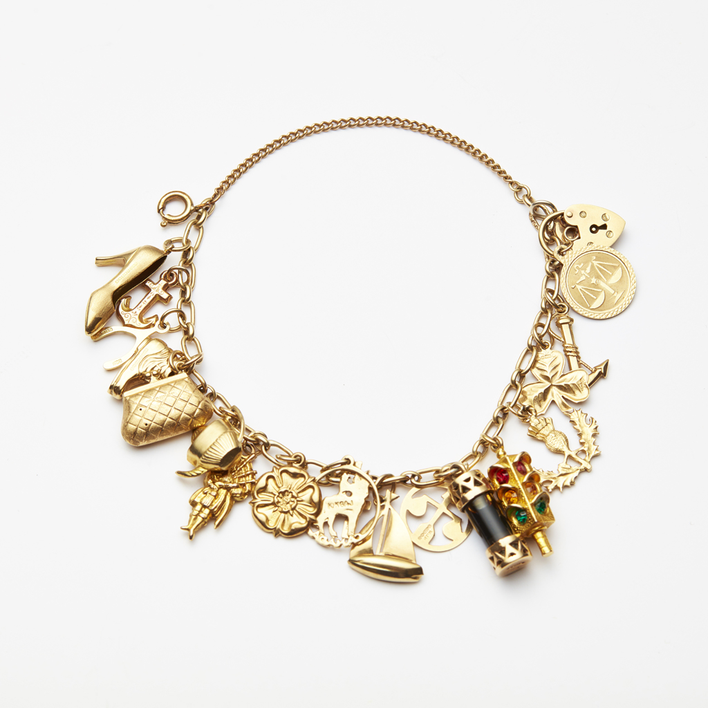 A 9ct gold charm bracelet