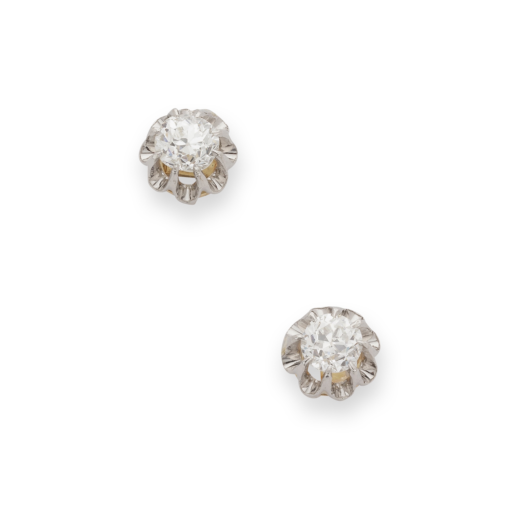 A pair of diamond stud earrings