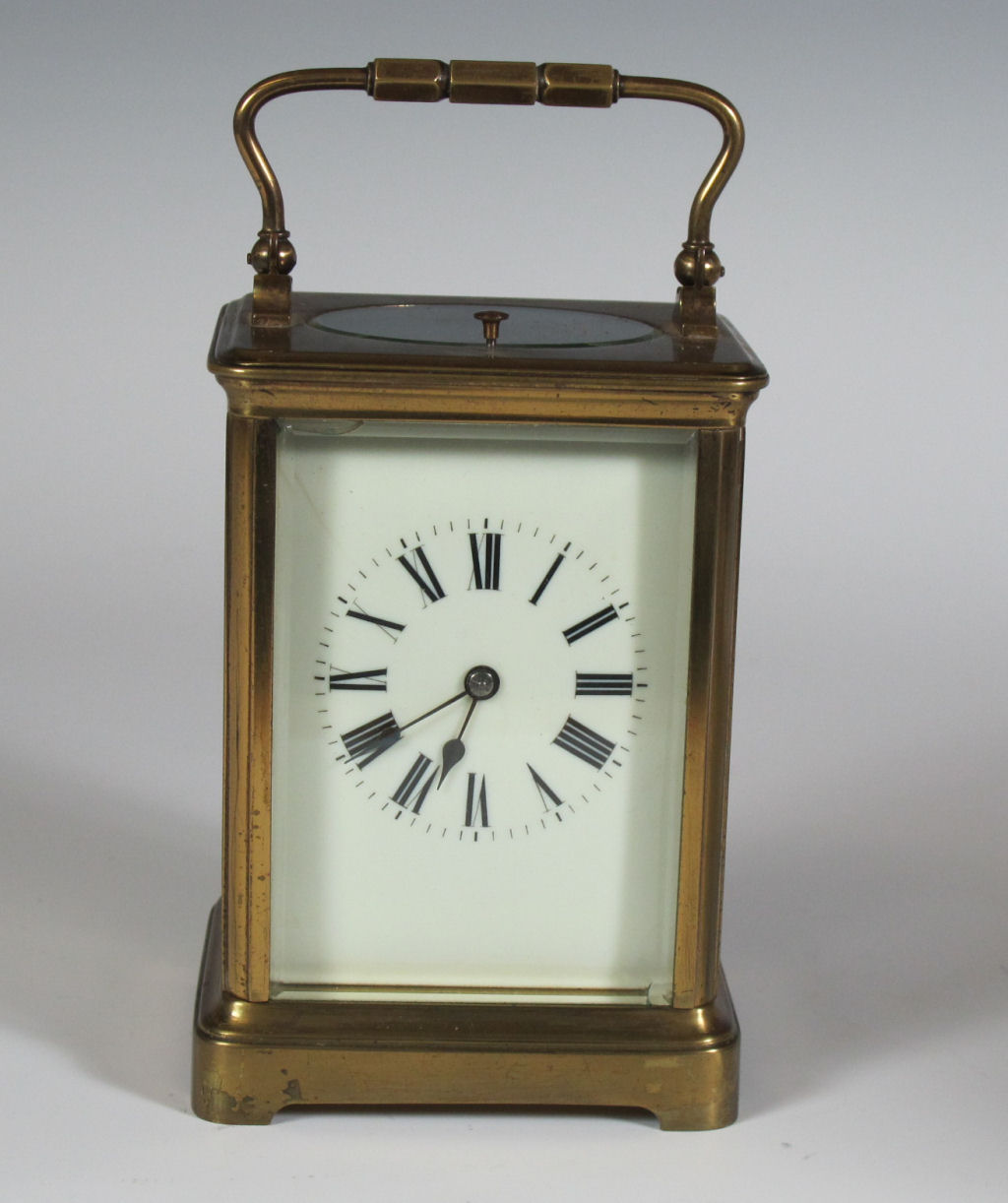 A brass repeater carriage clock