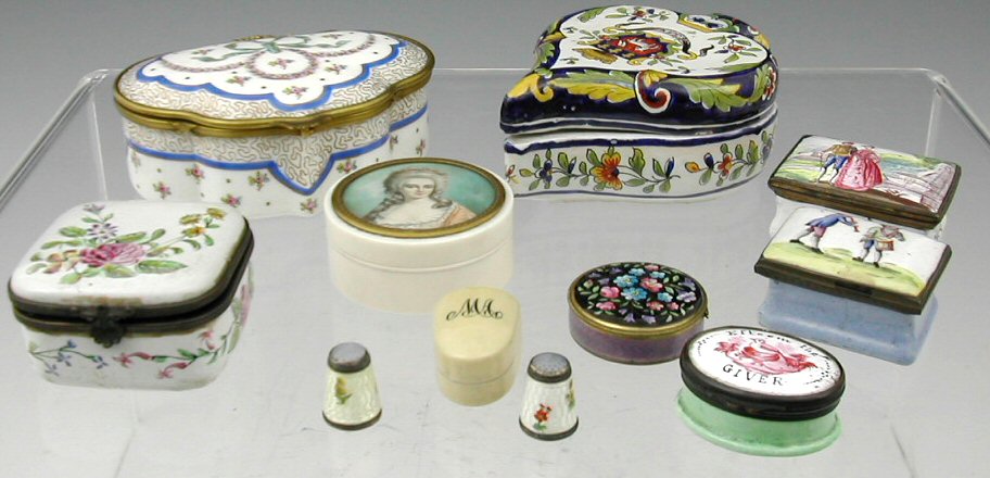 A collection of 18th century and later enamel and porcelain boxes,