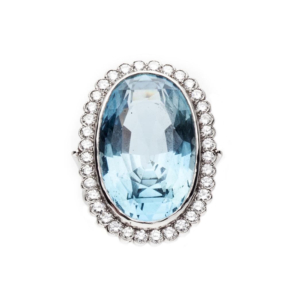 An aquamarine and diamond set cocktail ring