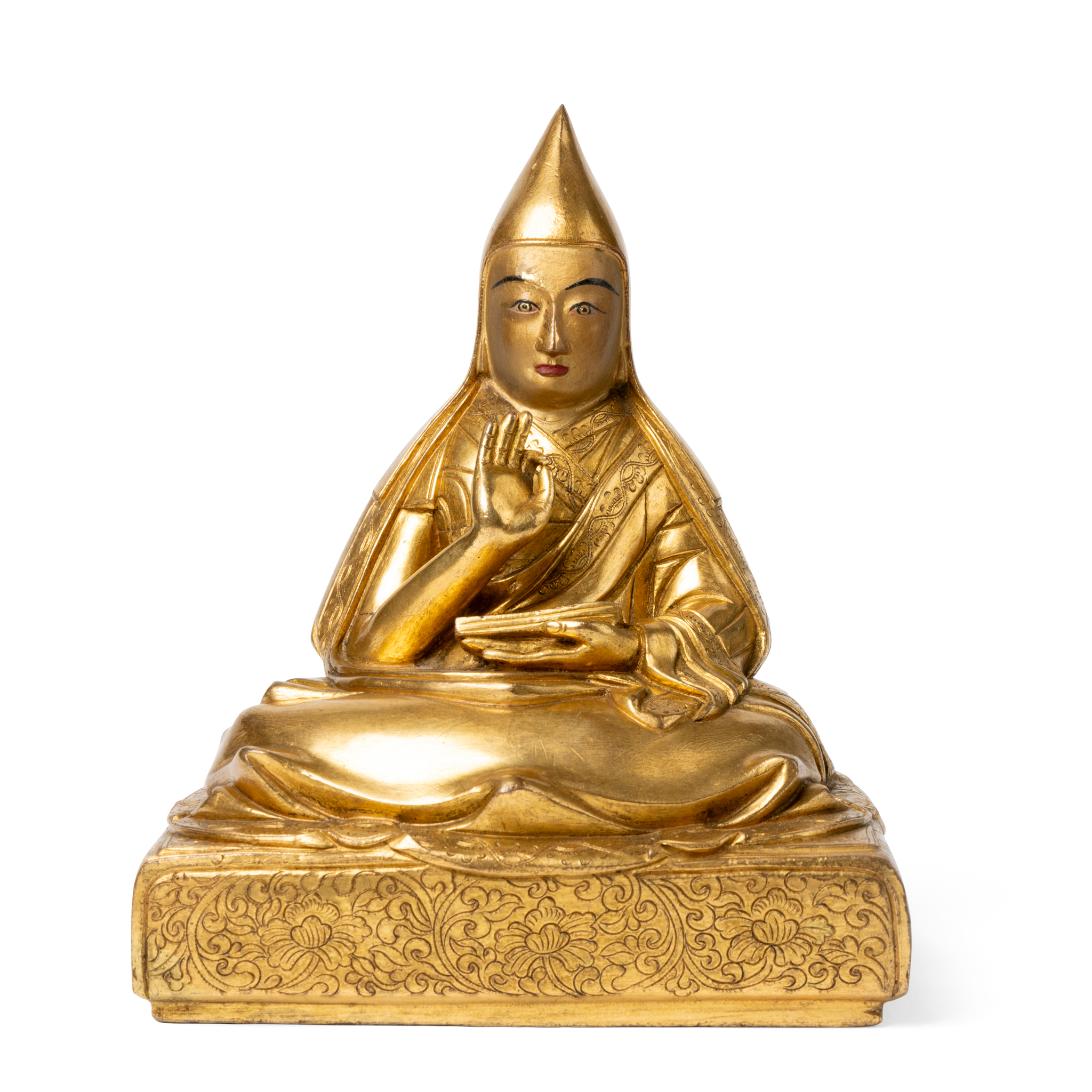 TIBETAN GILT COPPER ALLOY FIGURE OF A GELUGPA LAMA