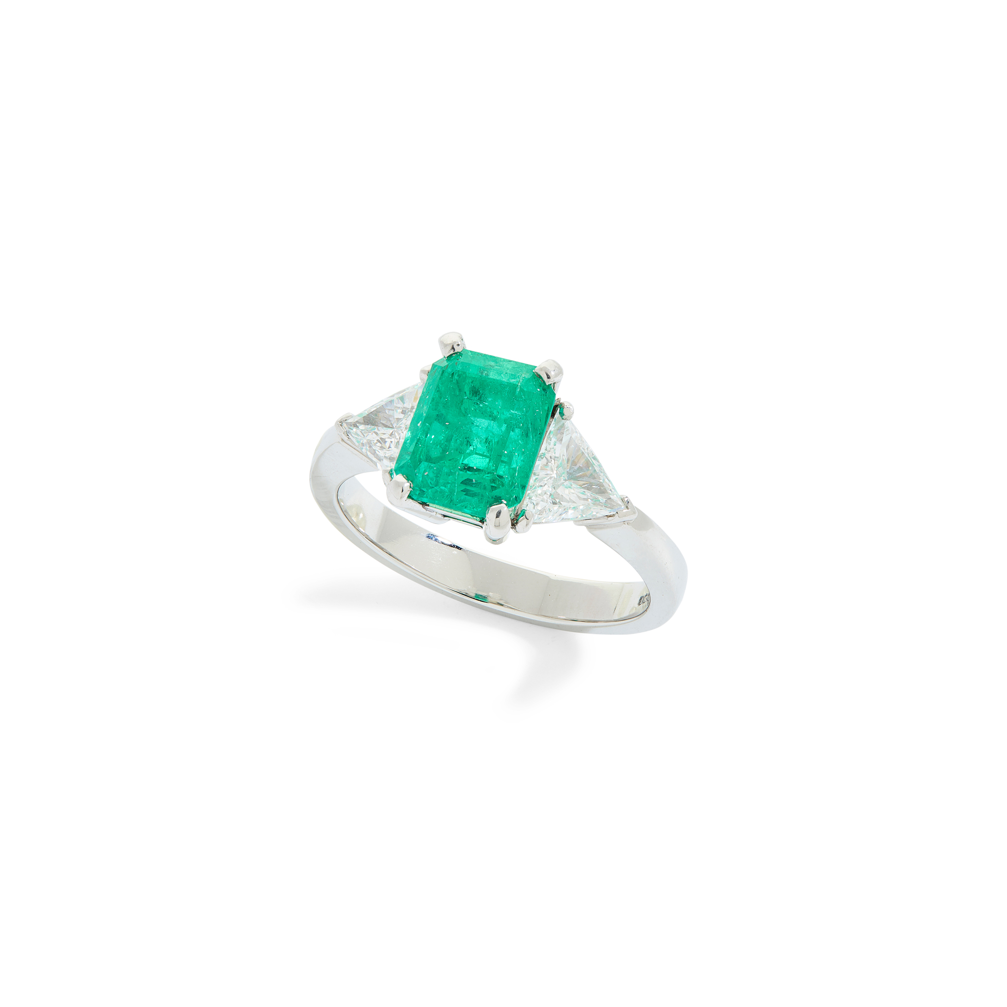 Eric N. Smith: An emerald and diamond three-stone ring