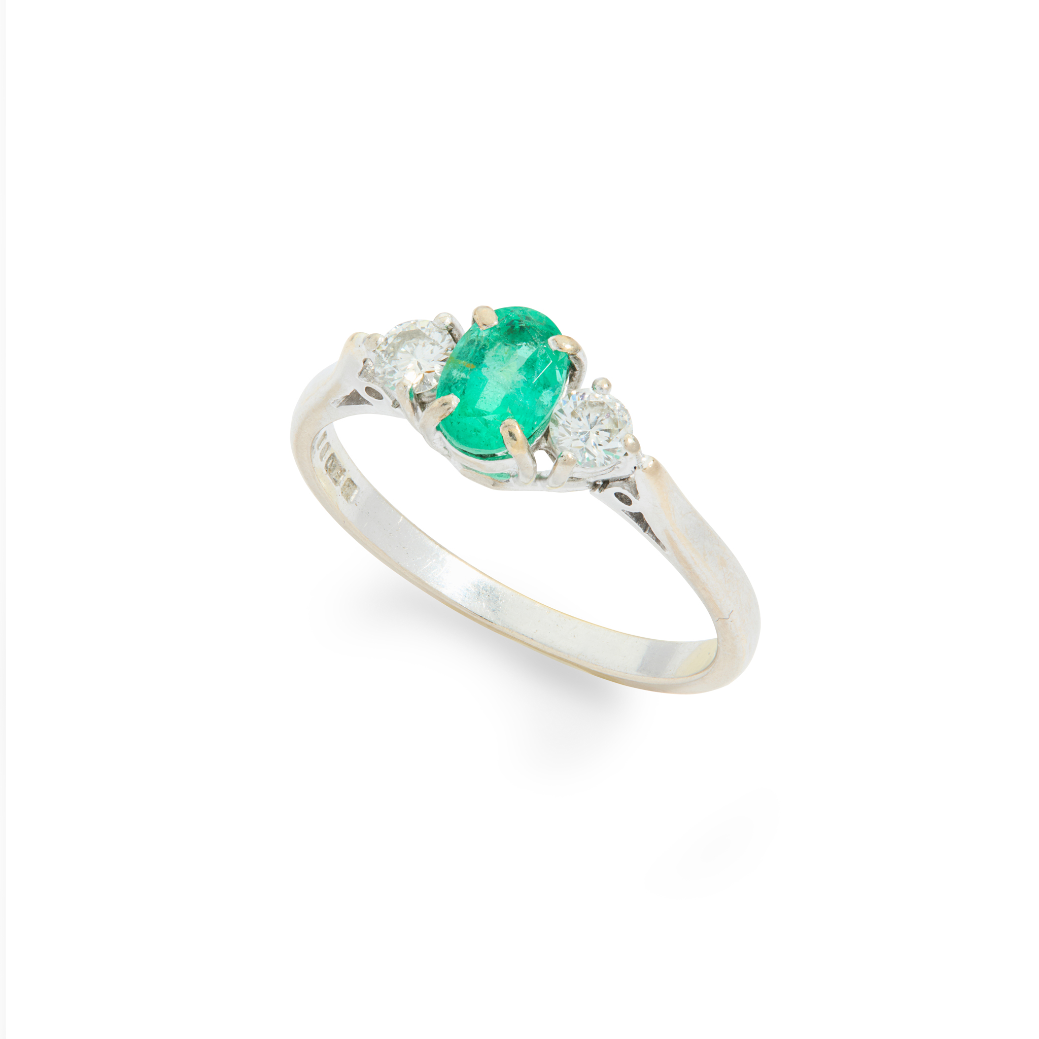 An 18ct gold emerald and diamond three-stone ring
