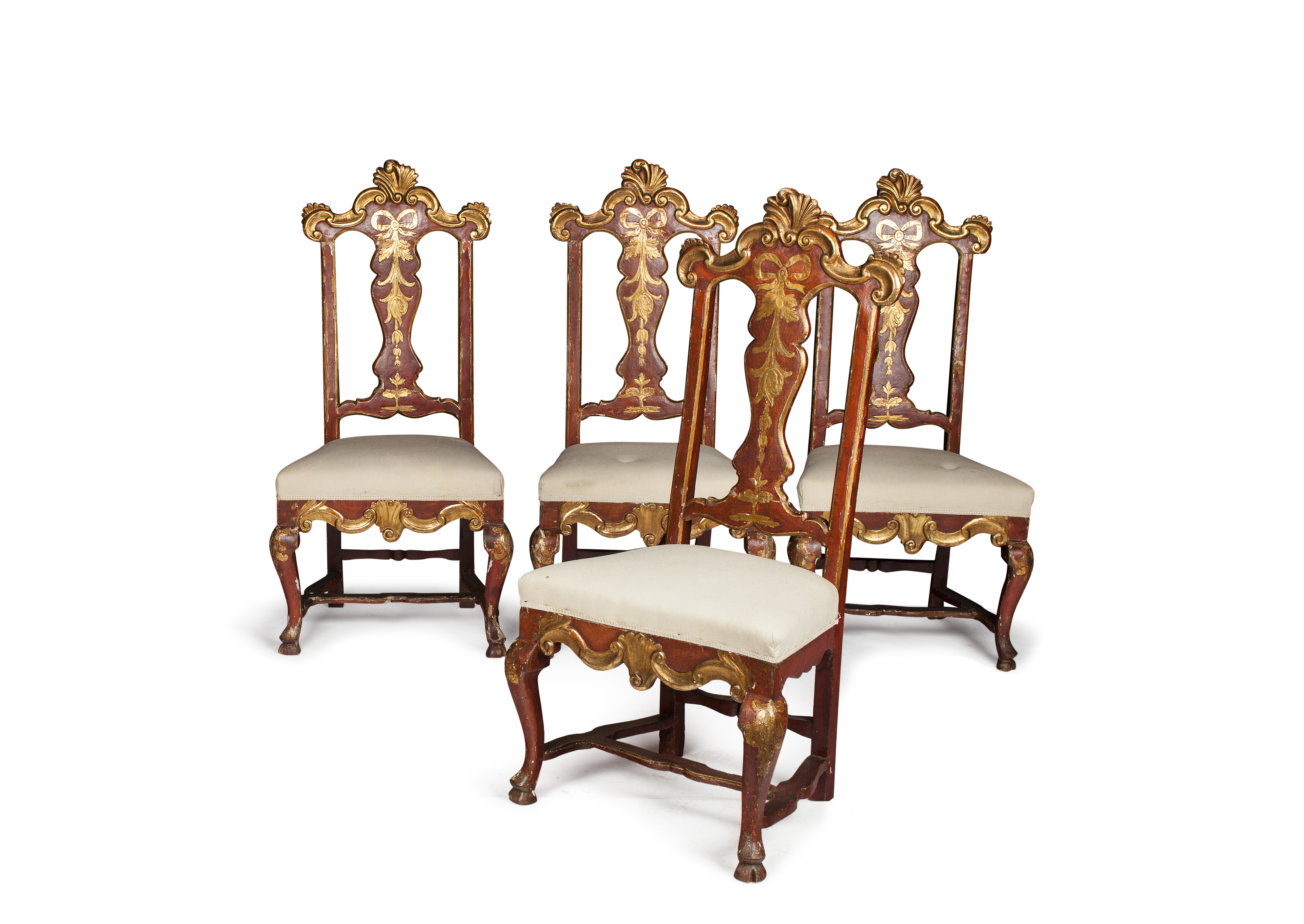 SET OF FOUR ITALIAN RED PAINTED AND PARCEL GILT CHAIRS