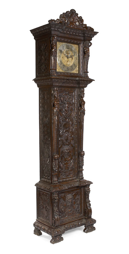 An 19th century carved walnut chiming longcase clock, of impressive proportions By Maple & Co. Ltd., London