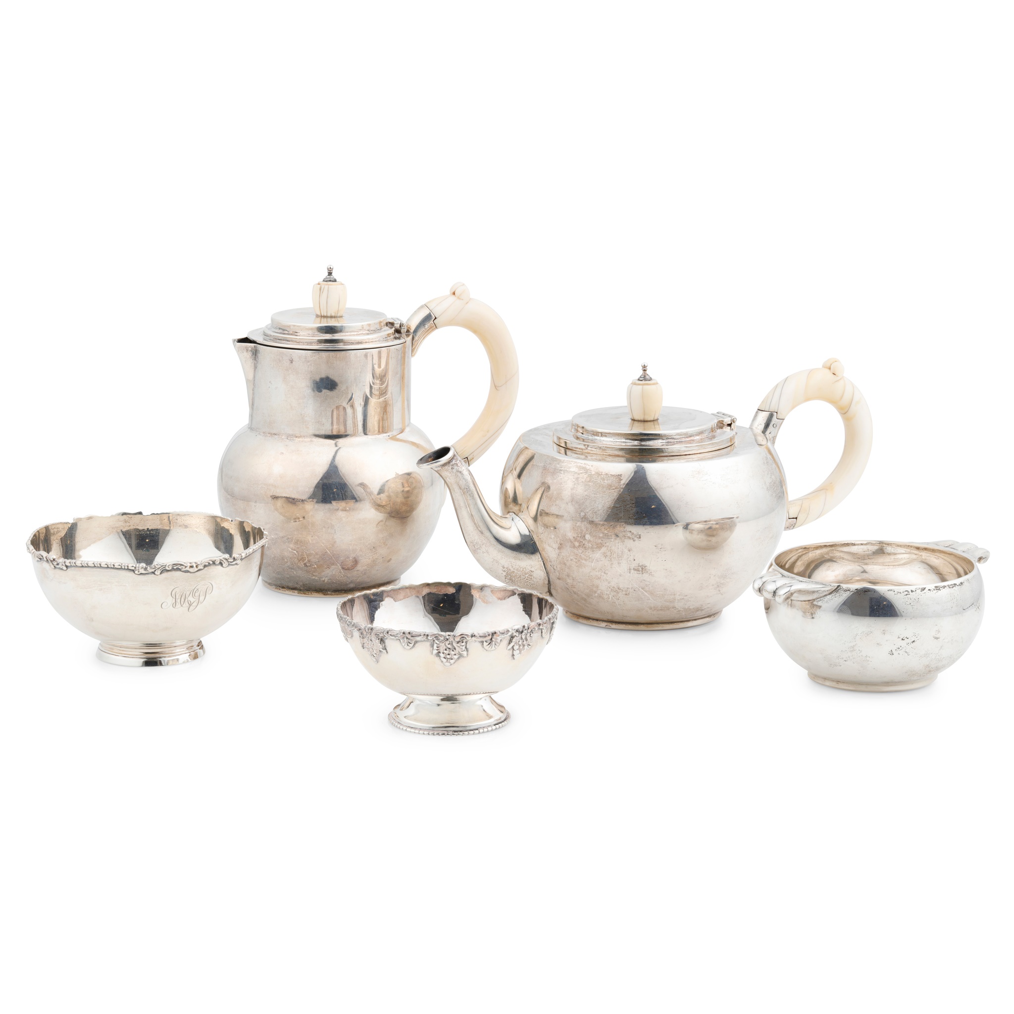 A matched three piece tea service