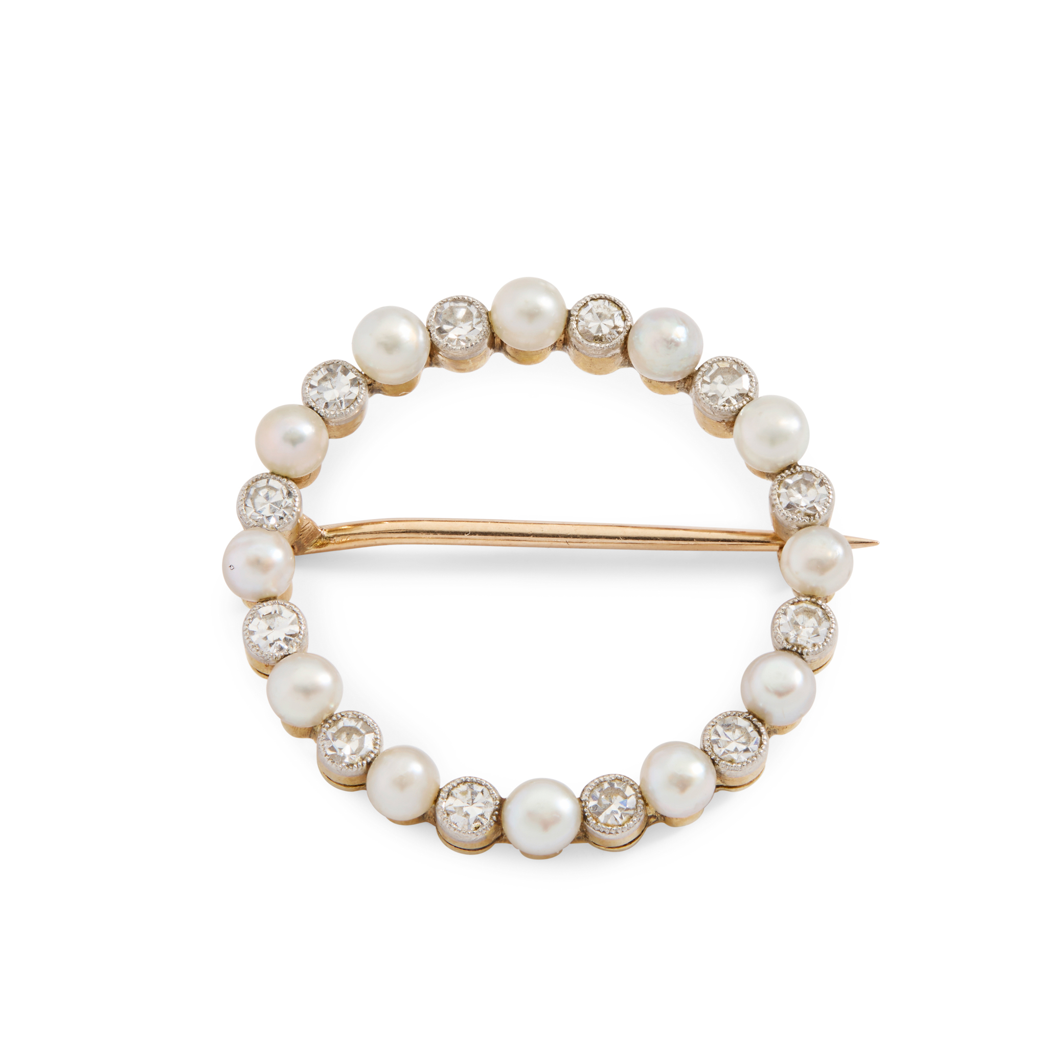 An early 20th century diamond and pearl brooch