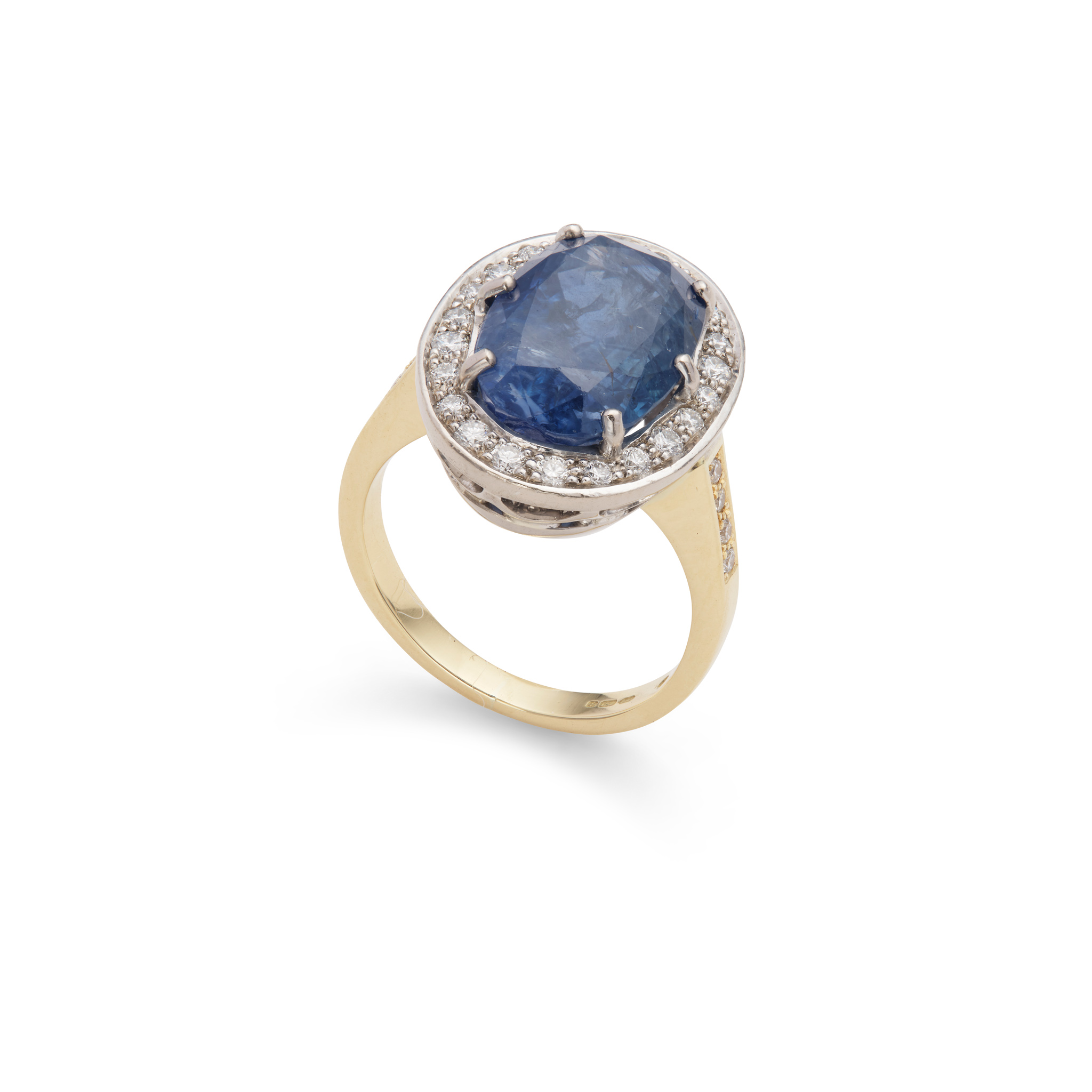 An 18ct gold sapphire and diamond cluster ring