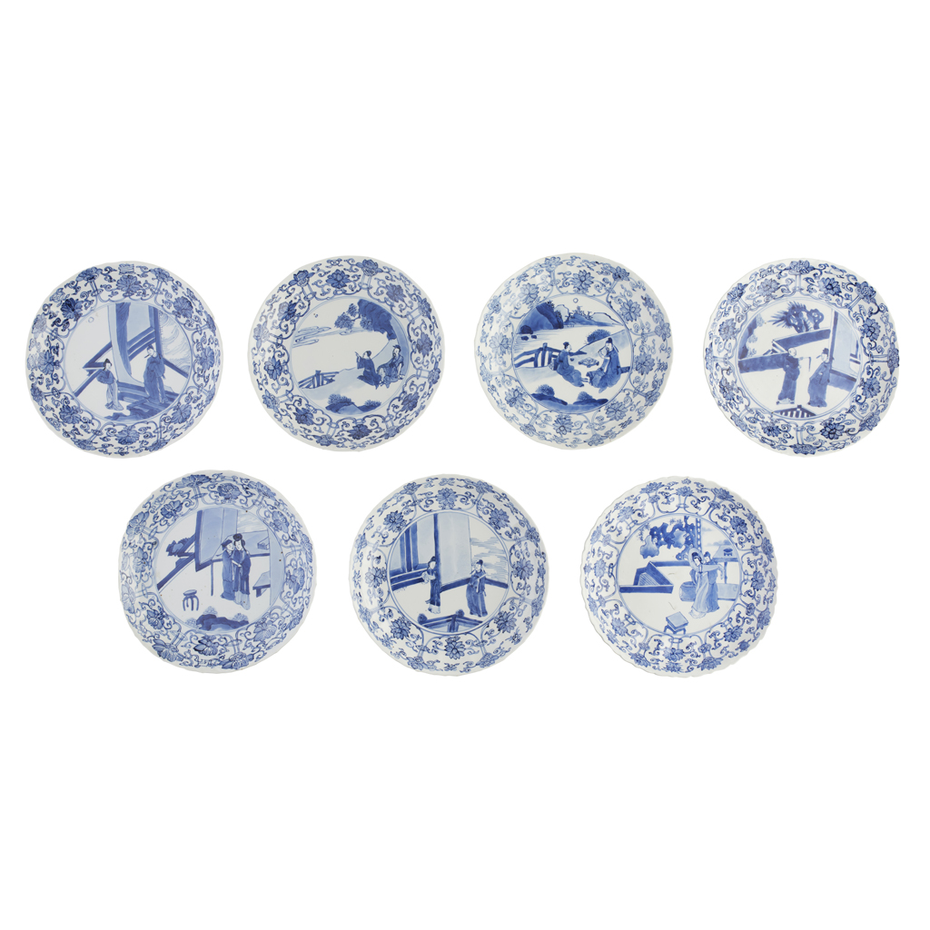 SEVEN BLUE AND WHITE BARBED-RIM DISHES