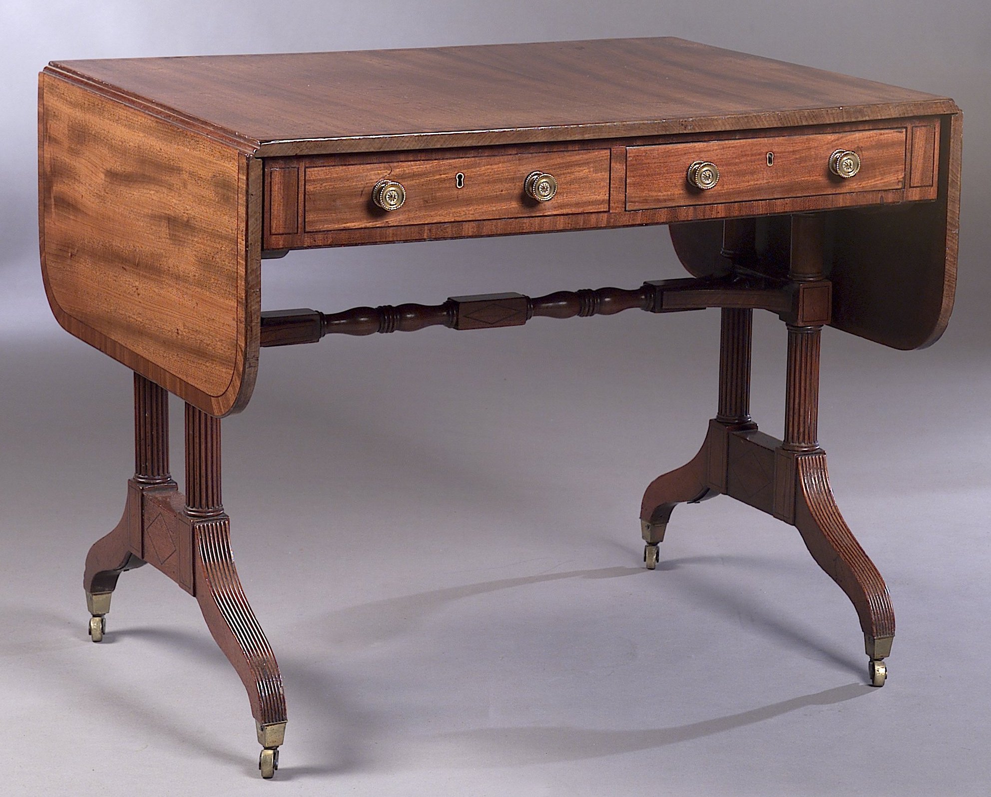 A Regency mahogany sofa table