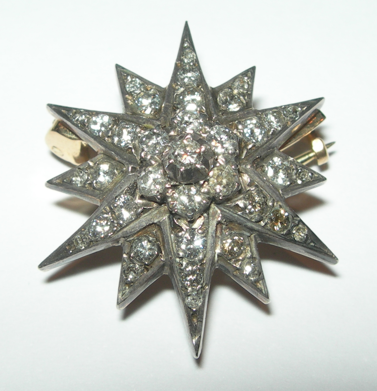 An early 20th century diamond set brooch,