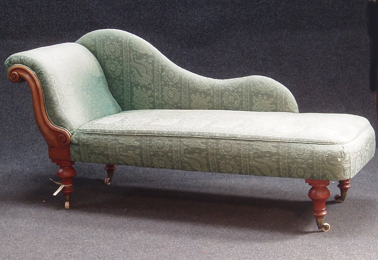 A Victorian mahogany framed upholstered chaise longue,