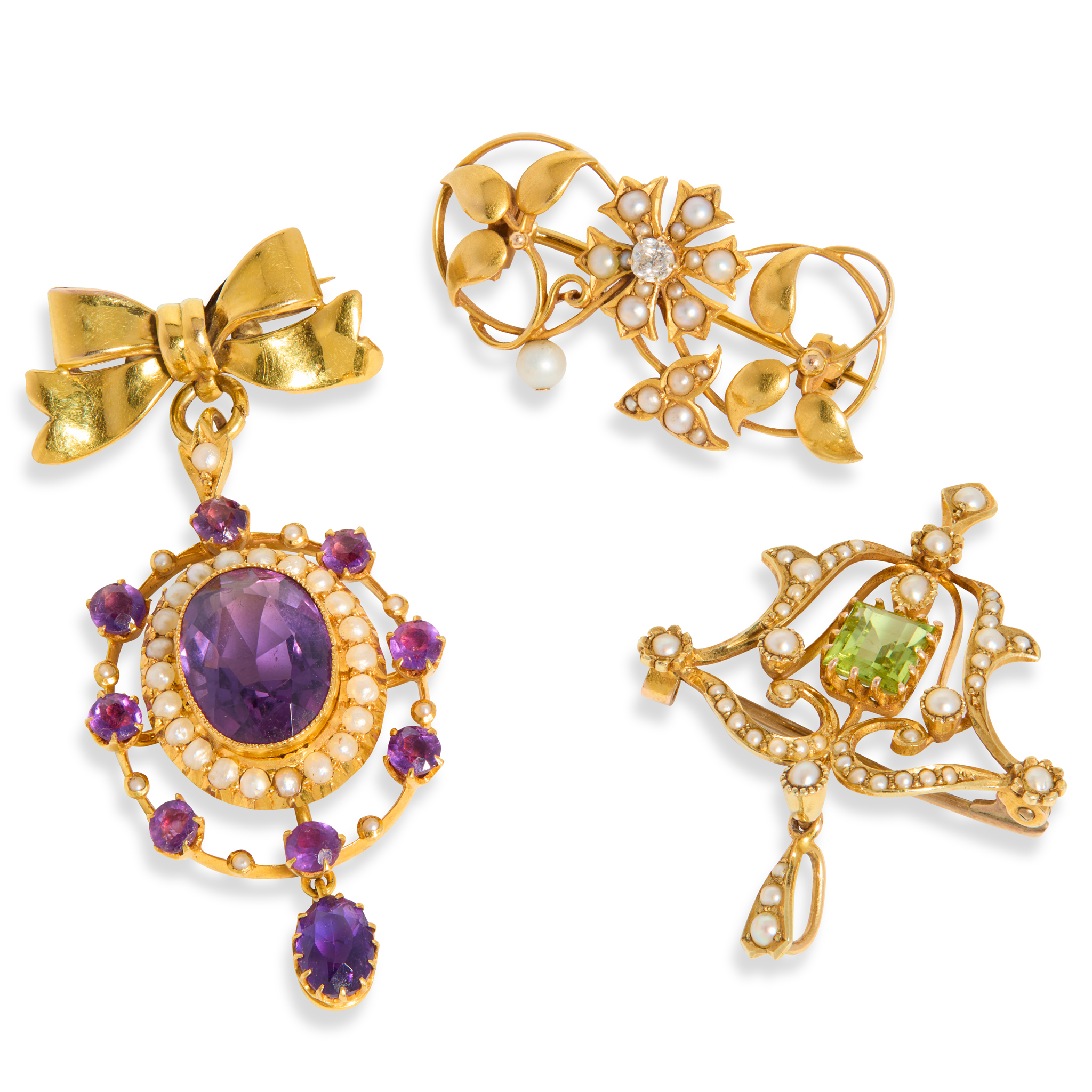 A collection of gem-set brooches
