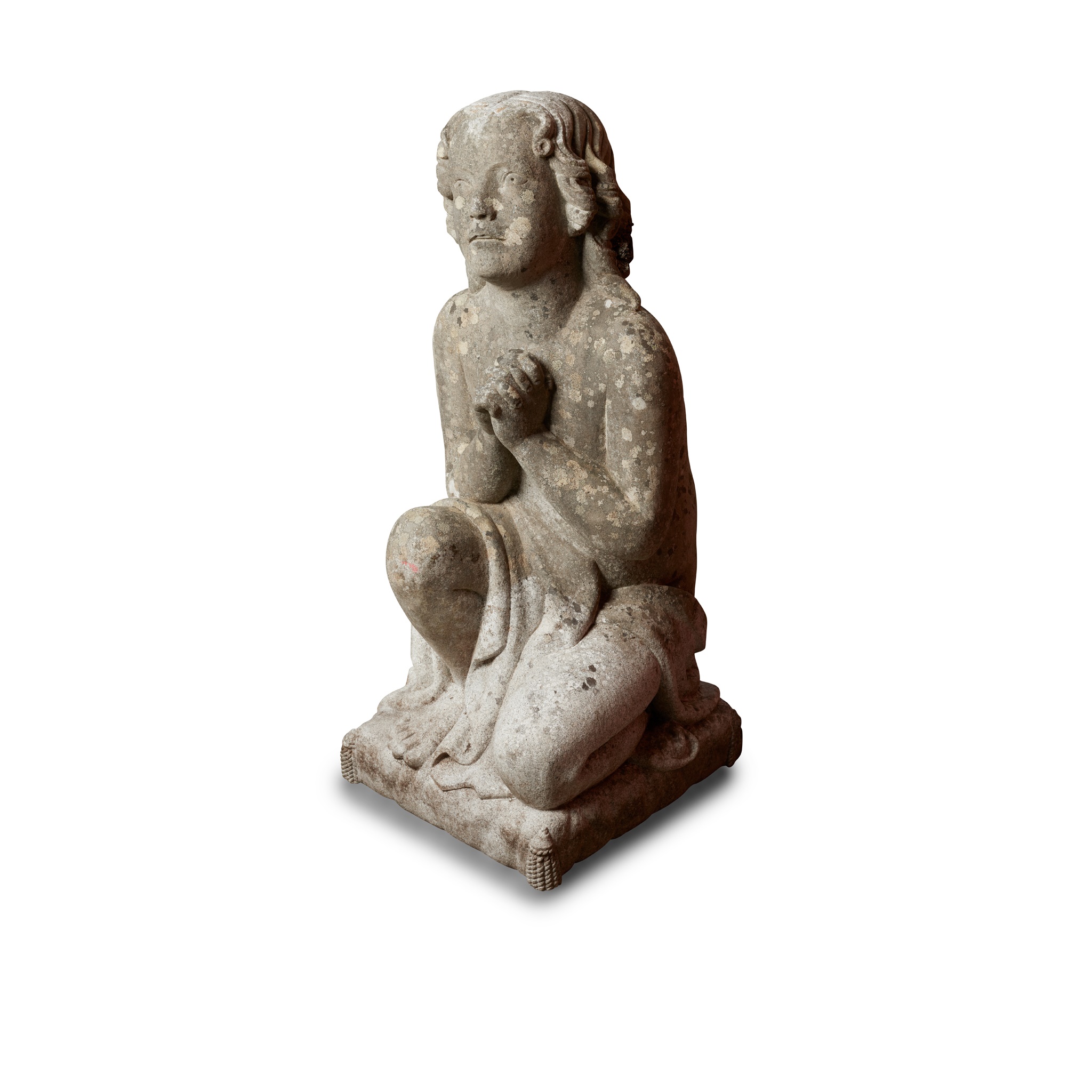 SCOTTISH SCHOOL, CARVED GRANITE FIGURE OF A KNEELING BOY