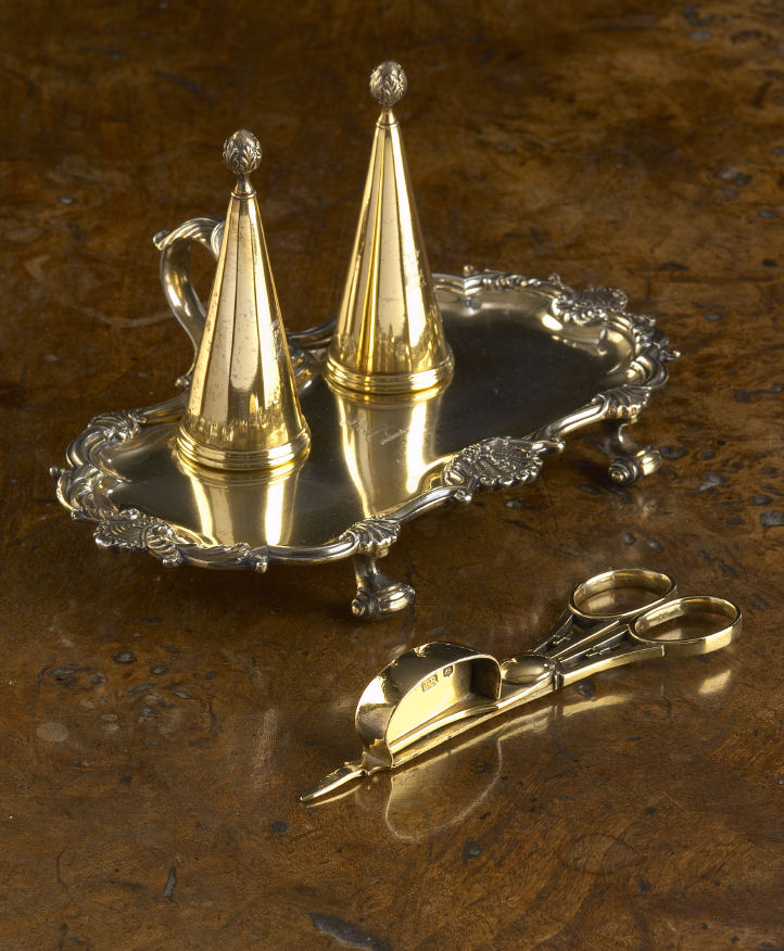 A George IV gilt candle snuffer stand