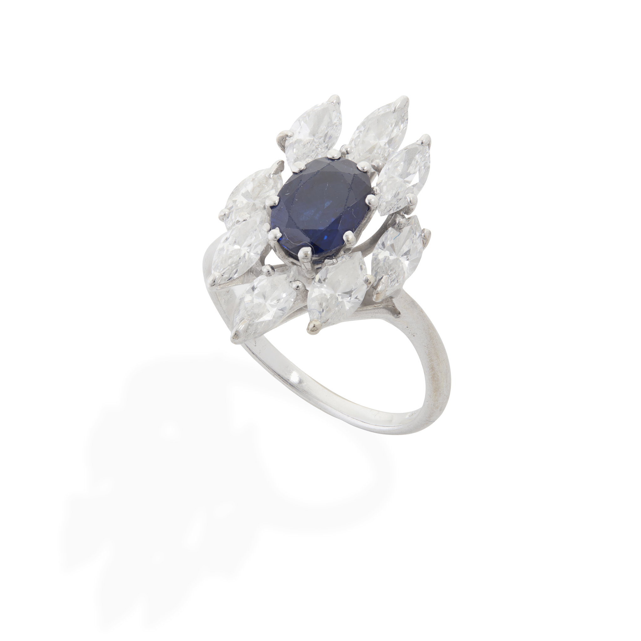 An 18ct gold sapphire and diamond cluster ring
