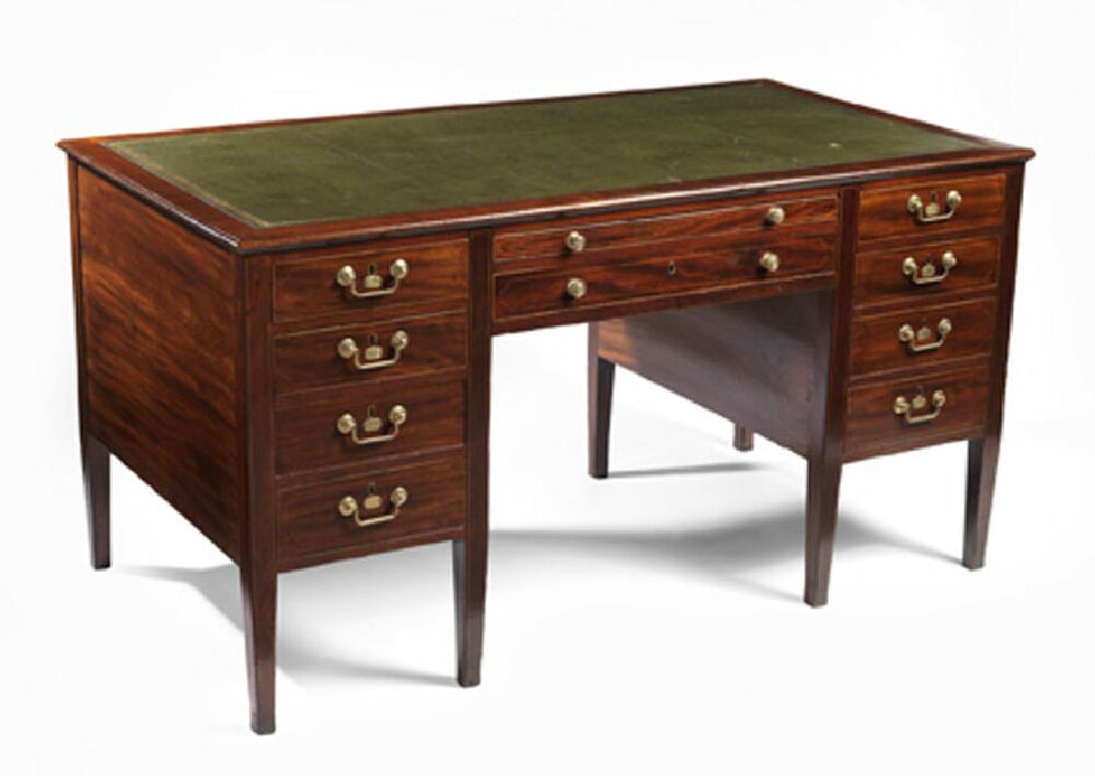 A George III mahogany kneehole partners' desk