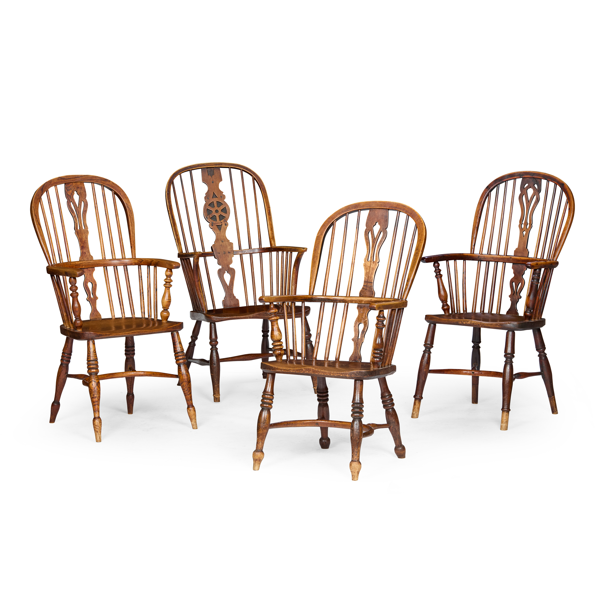 MATCHED SET OF FOUR ELM AND YEW WINDSOR ARMCHAIRS