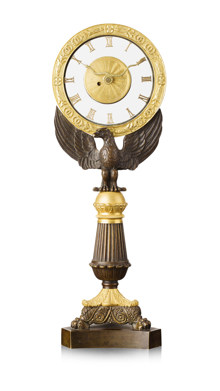CONTINENTAL RESTAURATION PATINATED AND GILT BRONZE TABLE MYSTERY CLOCK