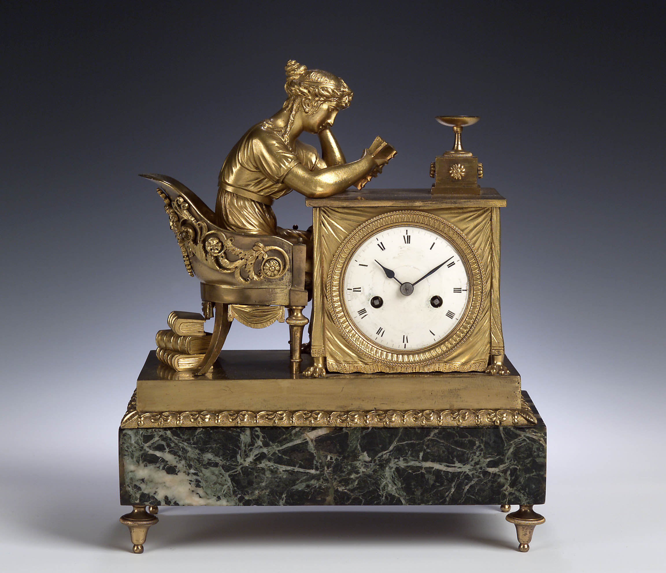 An Empire ormolu mantel clock