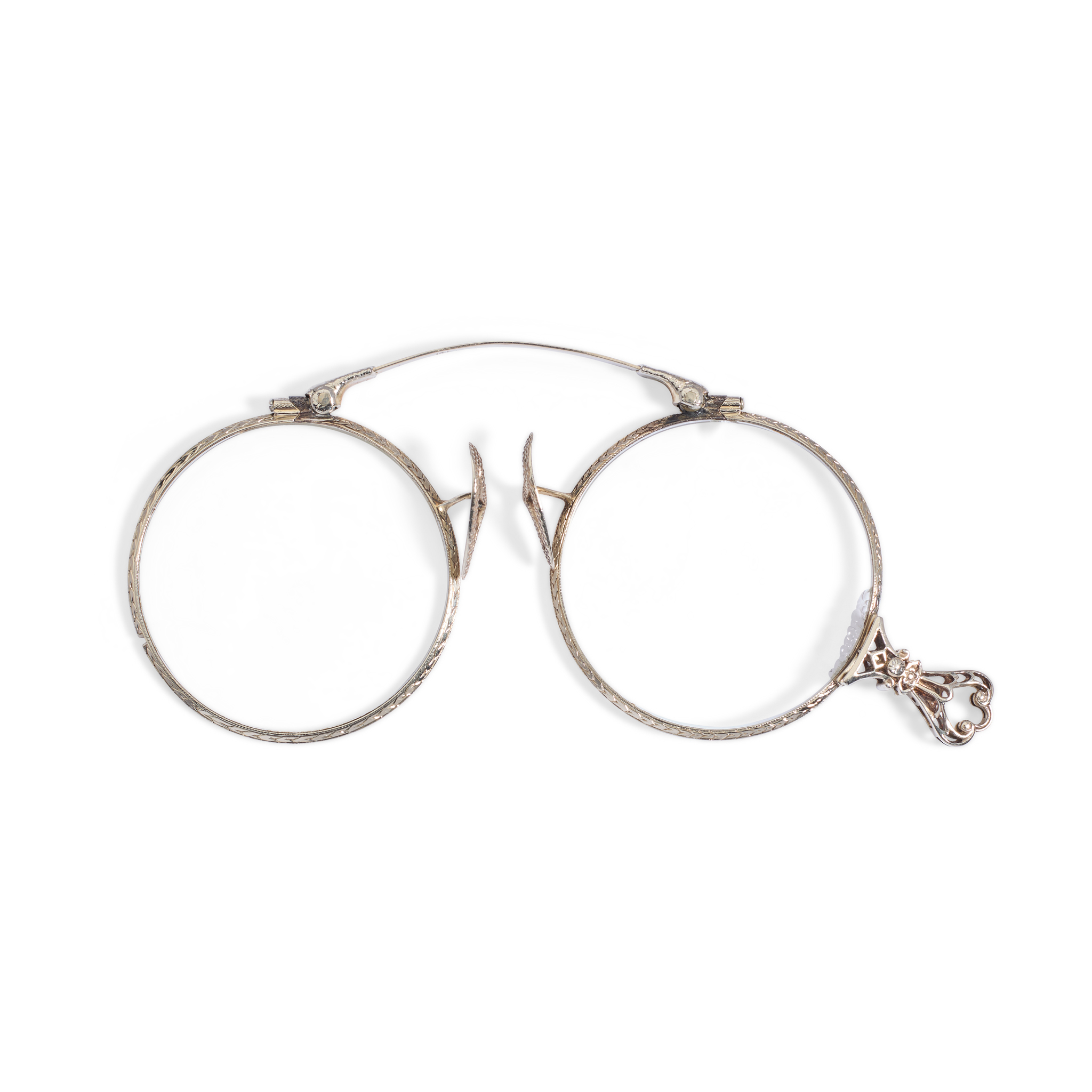 A pair of early 20th century lorgnettes or pince-nez spectacles