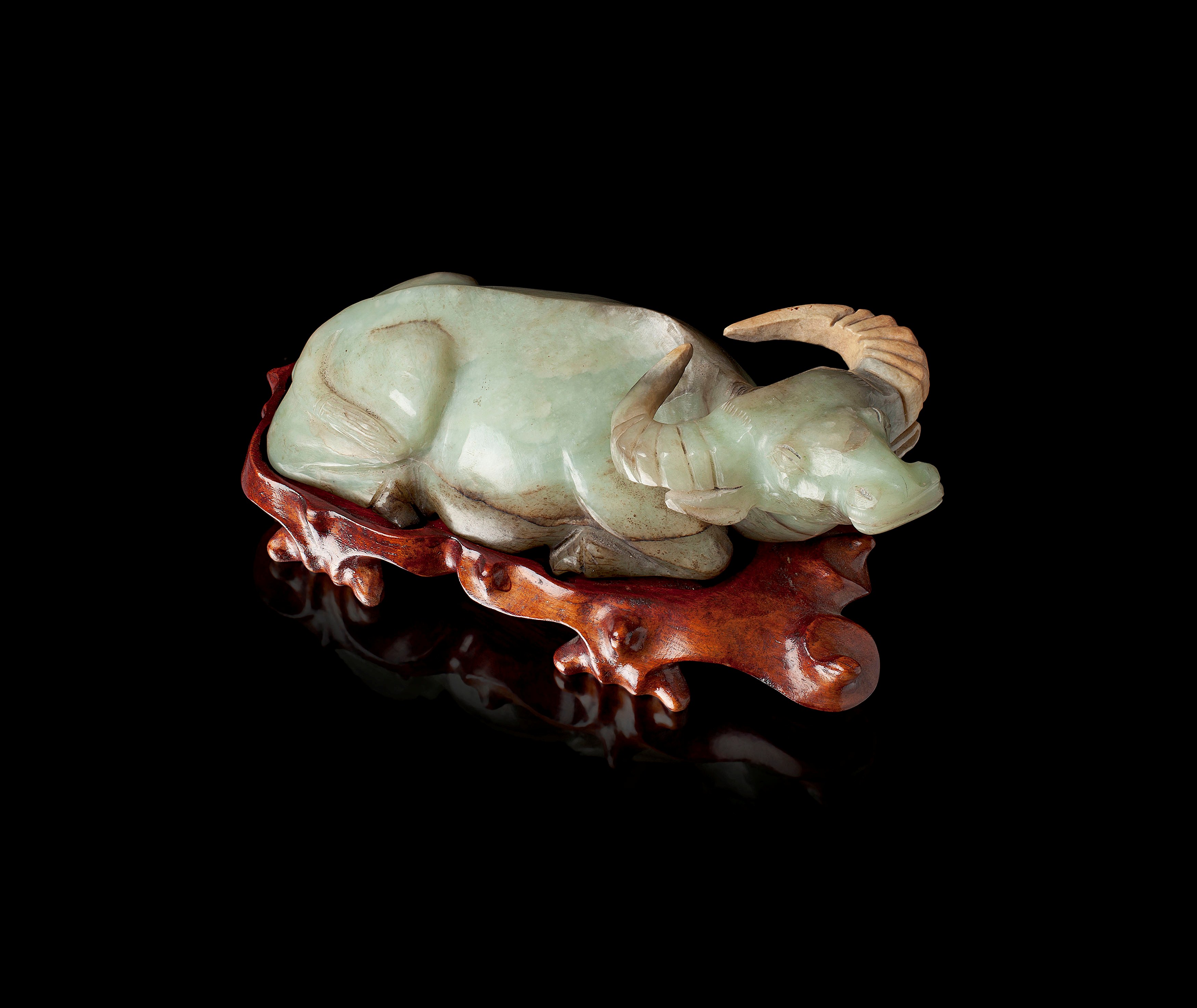 TWO CHINESE CARVED JADEITE FIGURES OF WATER BUFFALO