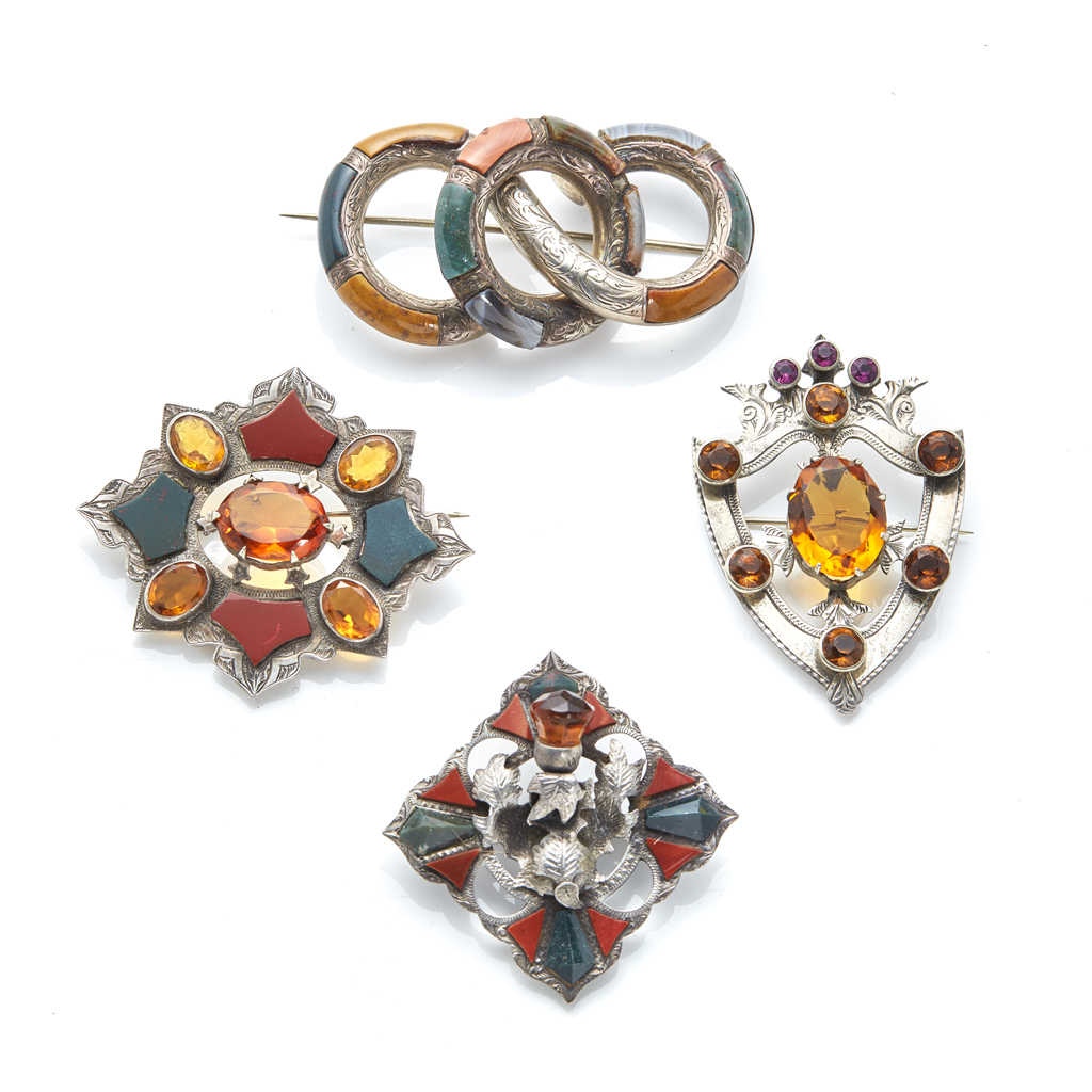 A collection of agate set brooches