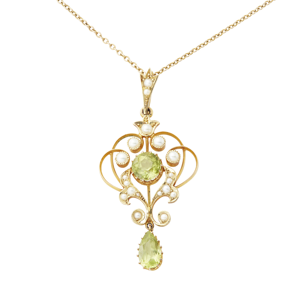 An Edwardian peridot and seed pearl set pendant