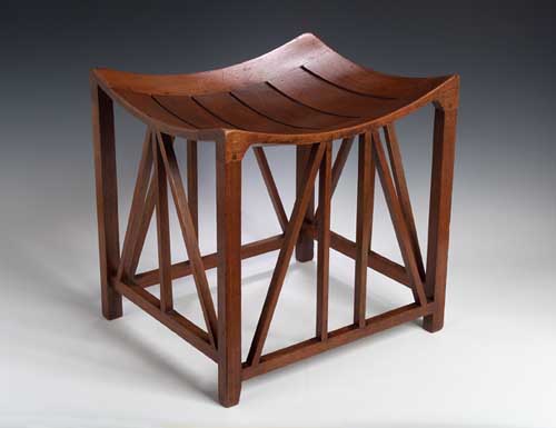 A Liberty & Co. mahogany 'Thebes' stool